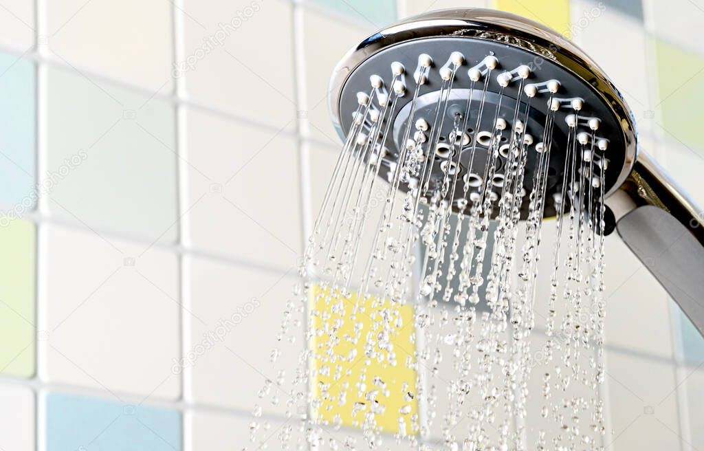 Shower head with flowing water bathroom in pastel colors