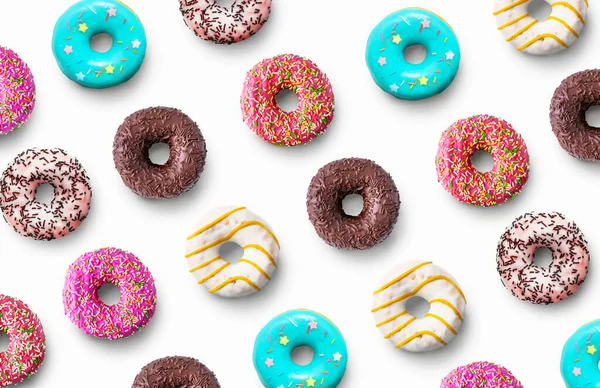 Delicious glazed donuts pattern on a white background. Top view. Flat lay. — Stockfoto