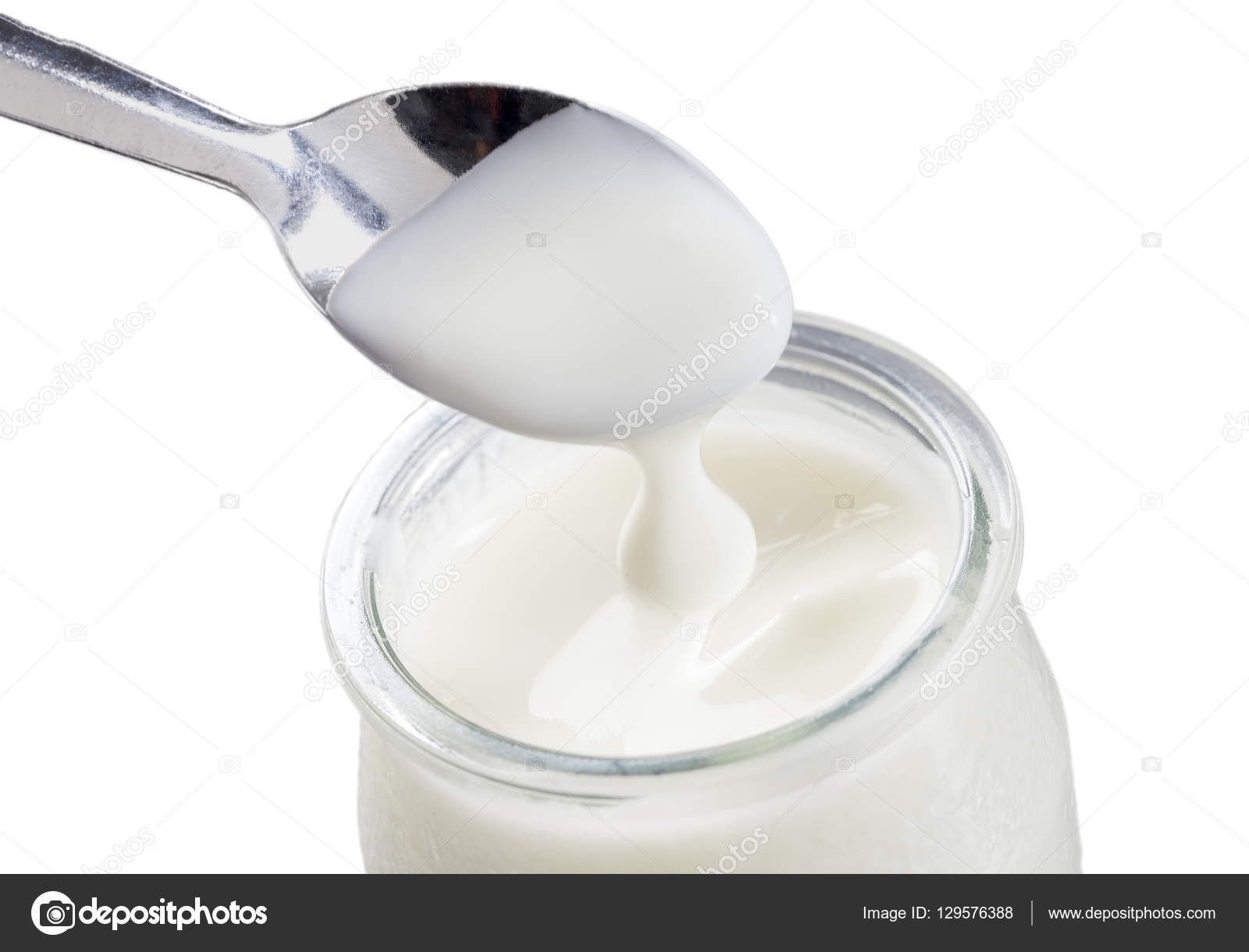 Greek Yogurt In A Glass Jars With Spoons On White Background Stock