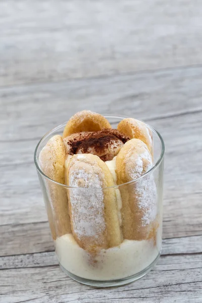 Litchi Tiramisu cake in glass, from lady finger biscuit mascarpone cream — Stock Photo, Image