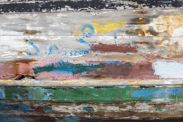 Wood texture, amazing combination green, yellow, red, white colors on old style wooden fishing boat, for background or texture — Stock Photo, Image