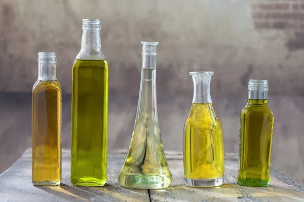 Various types of oil in bottles — Stock Photo, Image