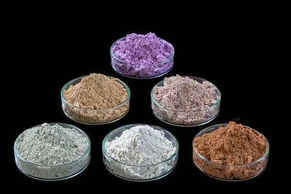 Ancient minerals - Clay of several colorsclay powder and mud mask for spa, beauty concept crop on black background — Stock Photo, Image