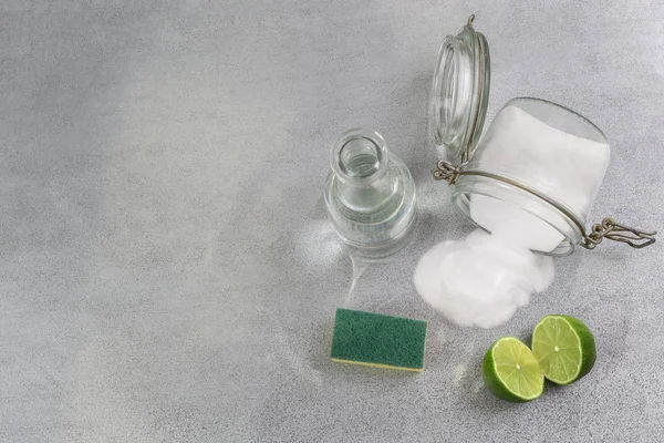 Eco-friendly natural cleaners, cleaning products. Homemade green cleaning on grey background. — Stock Photo, Image