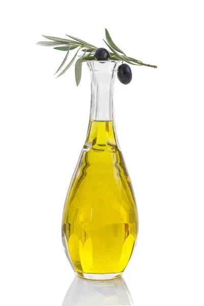 科西嘉, 传统的橄榄油玻璃瓶和橄榄树枝上的白色 vackground — 图库照片