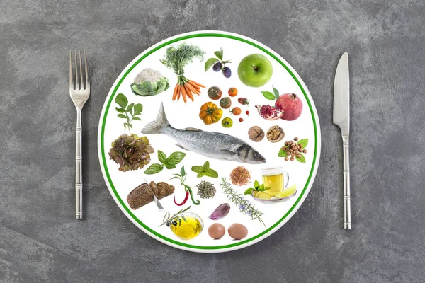 concept of good food, in a plate, food, diet balance on a grey slate background