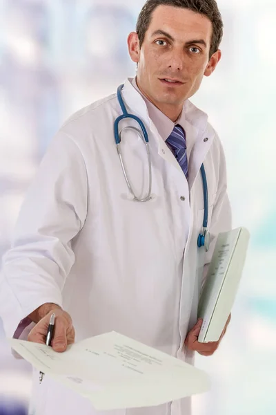 Male medicine doctor hand hold clipboard pad and give prescription to patient closeup. prescribe treatment, legal drug store, contraception concept. — Stock Photo, Image