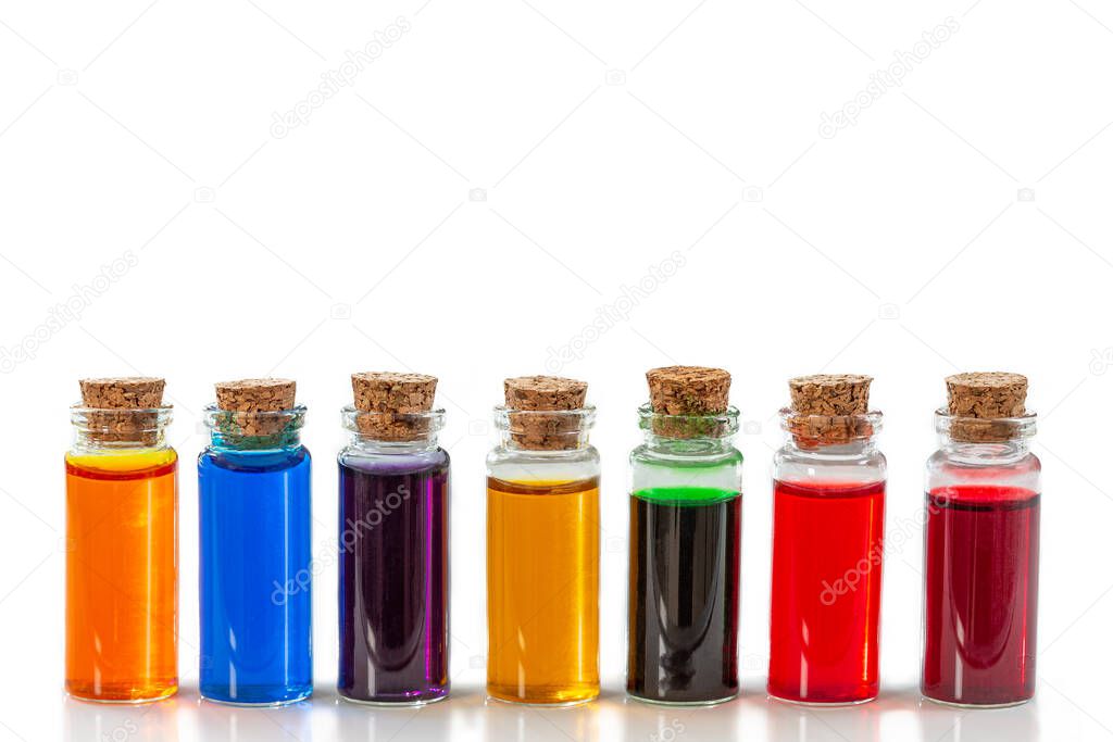 bottles of food coloring isolated on white background