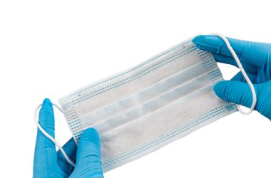 El ele tutuşan maske ve hava kirliliğinden korunmak için giyilen toz savunması ve sağlık hizmetlerini koronavirüs salgınından korumak