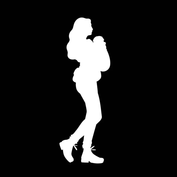 Young mother with baby carrier taking a walk with her baby. White silhouette isolated on black background. Concept. Vector illustration of woman with child. Stencil. Monochrome minimalism. — Stock Vector