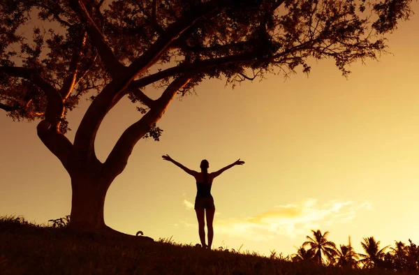 Silhouette of young girl outdoor. Freedom concept.