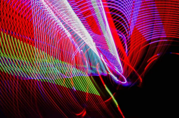 Light effects with blurred magic neon light curved lines