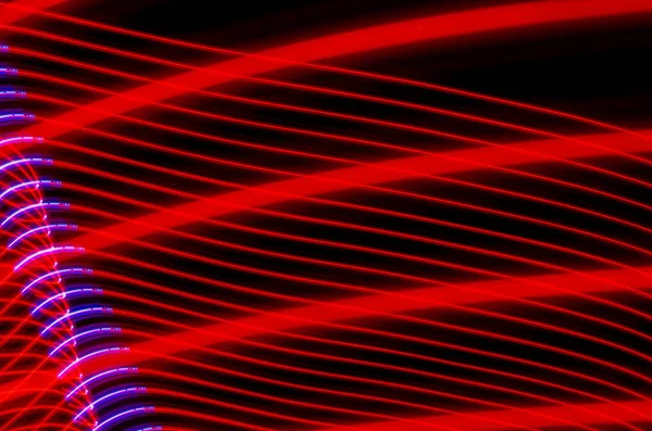 Light effects with blurred magic neon light curved lines