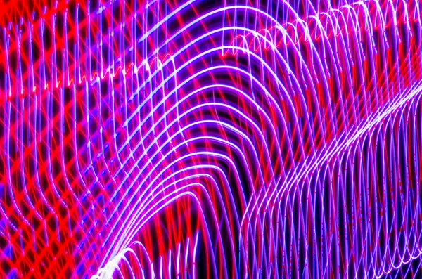 Light effects with blurred magic neon light curved lines