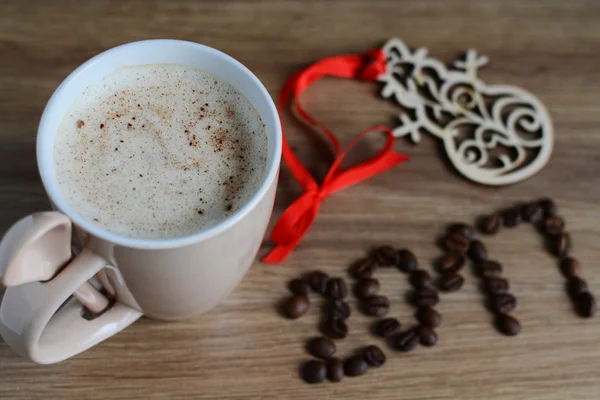 Cup of  cappuccino with christmas decorations — Stock Photo, Image