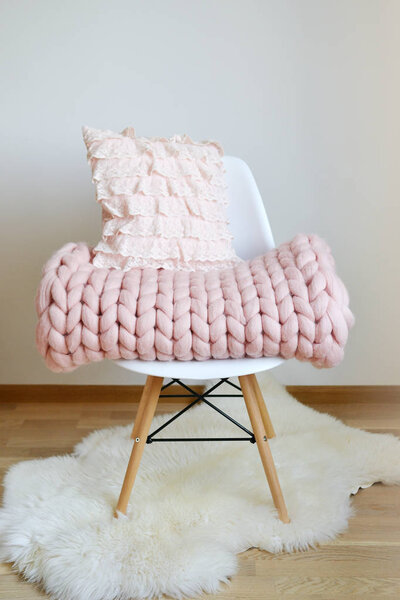 Giant Pink Plaid Blanket Woolen Knitted on White Wooden Stool Chair Home Scandinavian Style