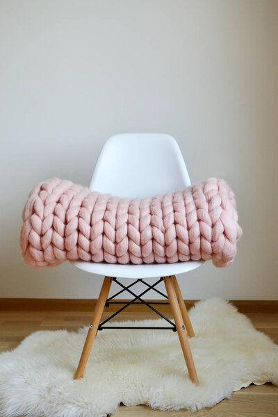 Giant Pink Plaid Blanket Woolen Knitted on White Wooden Stool Chair Home Scandinavian Style