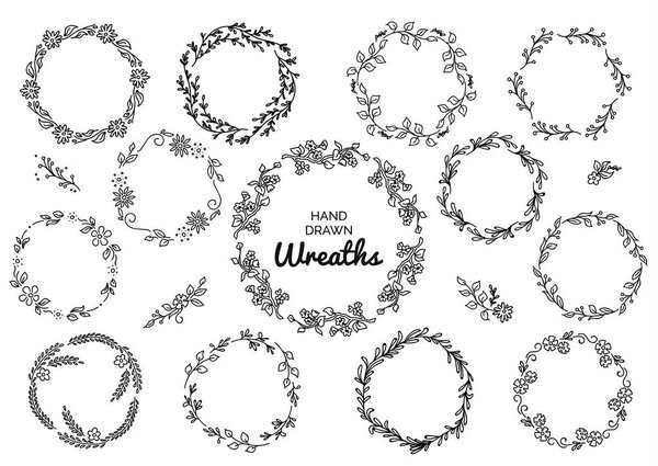Vintage set of hand drawn rustic wreaths. Floral vector graphic on white board. Nature design elements