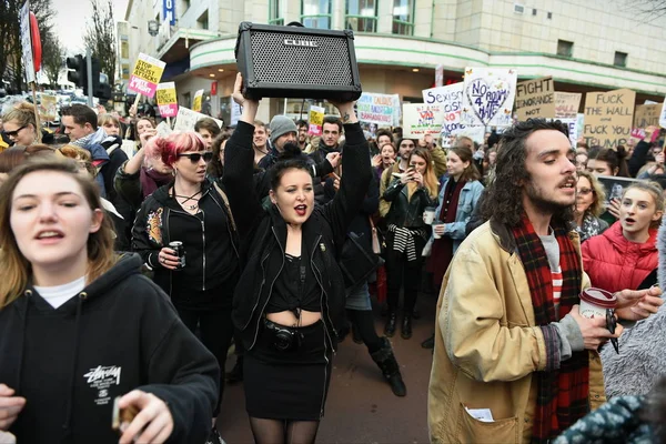 Protestersmarch through the city centre — Stock Photo, Image