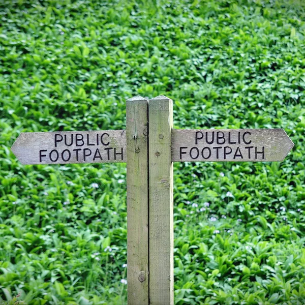 Public footpath sign in spring park