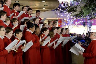 Bristol, UK - November 7, 2014: Bristol Cathedral Choir performing in Cabot Circus shopping mall.  clipart