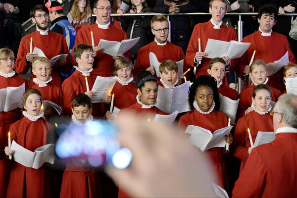 Bristol, UK - November 7, 2014: Bristol Cathedral Choir performing in Cabot Circus shopping mall. 