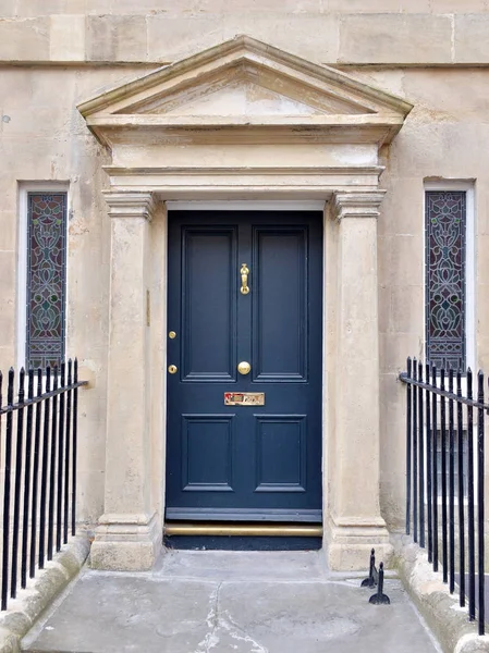 Elegant house door in dark blue color