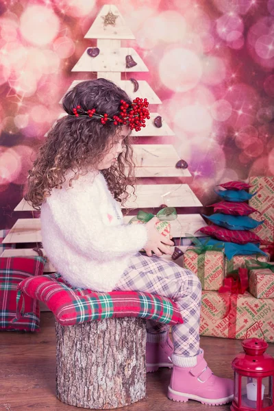 Portrait of pretty beautiful sweet little girl in Christmas interior — Stock Photo, Image