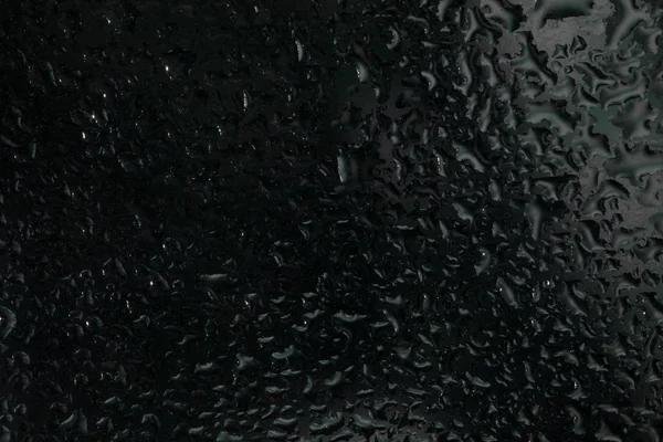 Drops of rain on a window glass. Color — Stock Photo, Image