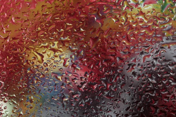 Капли дождя на оконное стекло. Цвет — стоковое фото