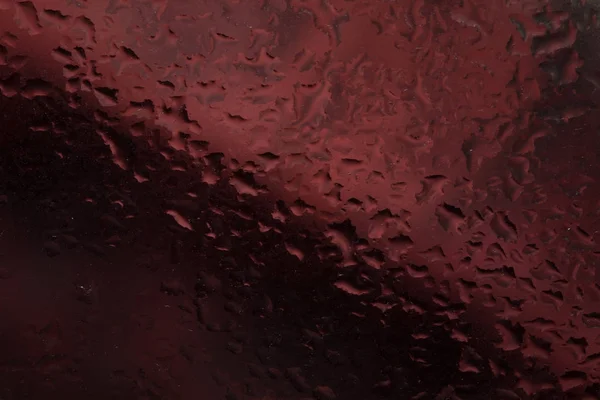 Regentropfen auf einem Fensterglas. Farbe — Stockfoto