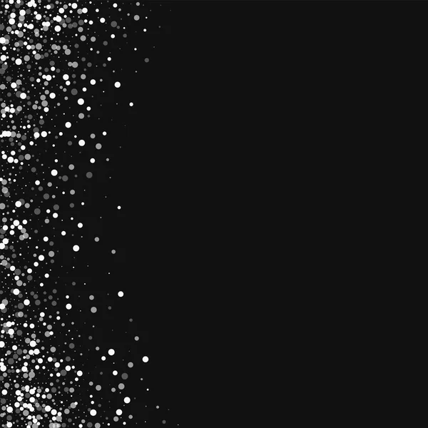 Willekeurige vallende witte stippen Abstract rand aan de linkerkant met willekeurige vallende witte stippen op zwarte achtergrond — Stockvector