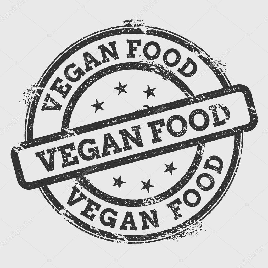 Vegan food rubber stamp isolated on white background Grunge round seal with text ink texture and