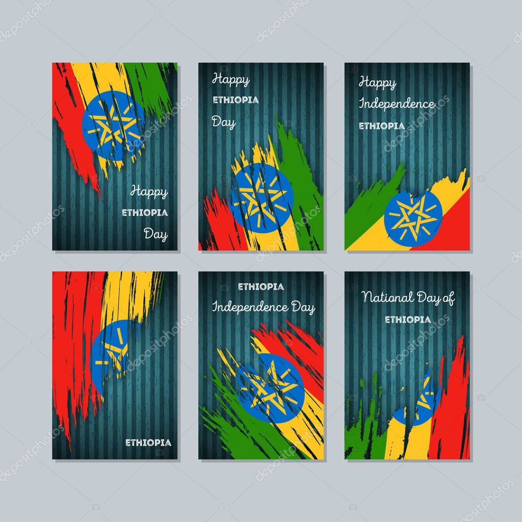 Ethiopia Patriotic Cards for National Day. Expressive Brush Stroke in National Flag Colors on dark striped background. Ethiopia Patriotic Vector Greeting Card.