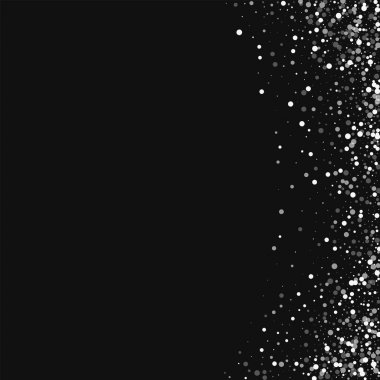 Siyah arka plan üzerine rastgele düşen beyaz noktalar rastgele düşme ile soyut sağ kenarlık beyaz noktalar