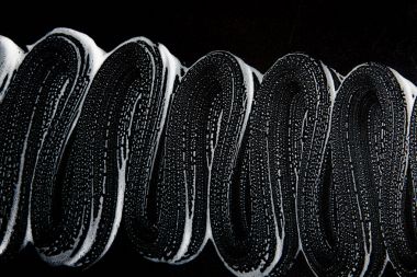 Beyaz sabun doku görkemli beyaz köpük üzerinde siyah arka plan el yapımı hipster köpük doku soyut