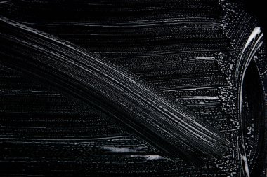 Beyaz sabun doku siyah arka plan el yapımı hipster köpük doku üzerinde inanılmaz beyaz köpük