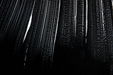 Beyaz sabun doku alışılmadık beyaz köpük üzerinde siyah arka plan el yapımı hipster köpük doku soyut