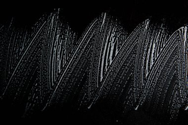 Beyaz sabun doku zarif beyaz köpük üzerinde siyah arka plan el yapımı hipster köpük doku soyut