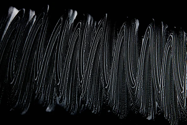 Beyaz sabun doku zarif beyaz köpük üzerinde siyah arka plan el yapımı hipster köpük doku soyut