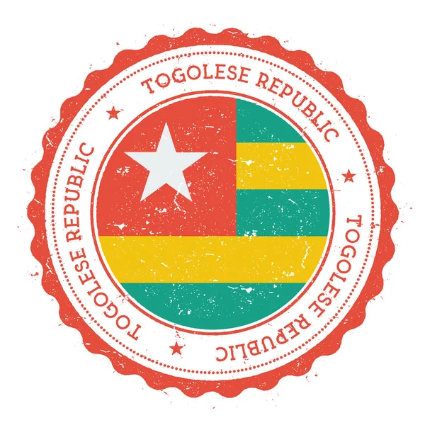 Sello de goma grunge con bandera de Togo Sello de viaje vintage con estrellas de texto circular y bandera nacional — Vector de stock