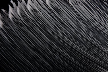 Beyaz sabun doku siyah arka plan el yapımı hipster köpük doku üzerine parlak beyaz köpük