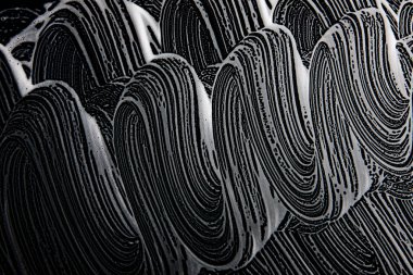 Beyaz sabun doku Ideal beyaz köpük üzerinde siyah arka plan el yapımı hipster köpük doku soyut