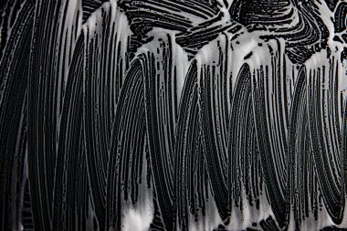 Beyaz sabun doku siyah arka planda el yapımı hipster köpük doku şaşaalı beyaz köpük