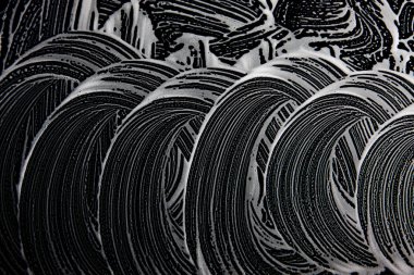 Beyaz sabun doku düzgün beyaz köpük üzerinde siyah arka plan el yapımı hipster köpük doku soyut