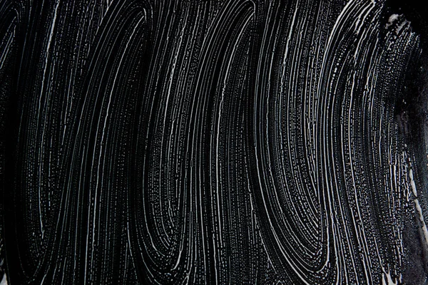 Beyaz sabun doku siyah arka planda el yapımı hipster köpük doku üstün beyaz köpük