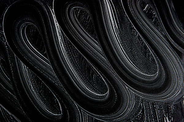 Beyaz sabun doku güzel beyaz köpük siyah arka planda el yapımı hipster köpük doku