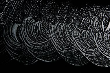 Beyaz sabun doku ilginç beyaz köpük siyah arka planda el yapımı hipster köpük doku