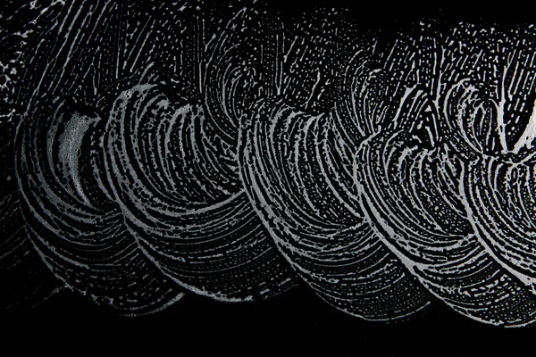 Beyaz sabun doku ilginç beyaz köpük siyah arka planda el yapımı hipster köpük doku