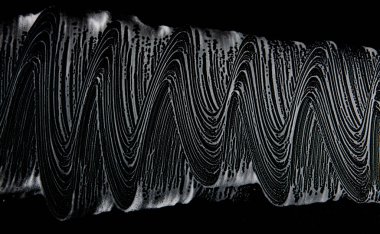 Beyaz sabun doku ilahi beyaz köpük üzerinde siyah arka plan el yapımı hipster köpük doku soyut